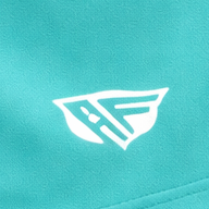 Close-up of RF-Wear Women's Solid Color Shorts in Teal with RF logo