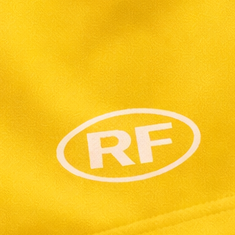 Close-up of RF-Wear Women's Solid Color Shorts in Yellow with RF logo