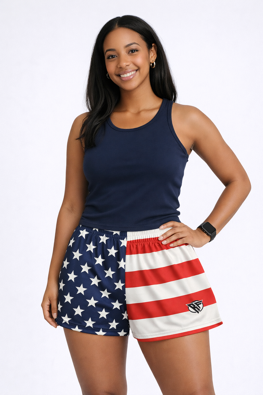 Woman wearing a navy top and RF-Wear Women's Split Flag Shorts in Red/White/Blue