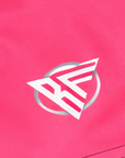 Close-up of RF-Wear Women's Split Flamingo Shorts in Pink/Black with RF logo