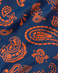 Close-up of RF-Wear Women's Split Paisley Shorts in Navy/Orange