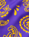 Close-up of RF-Wear Women's Split Paisley Shorts in Purple/Gold