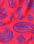 Close-up of RF-Wear Women's Split Paisley Shorts in Red/Blue