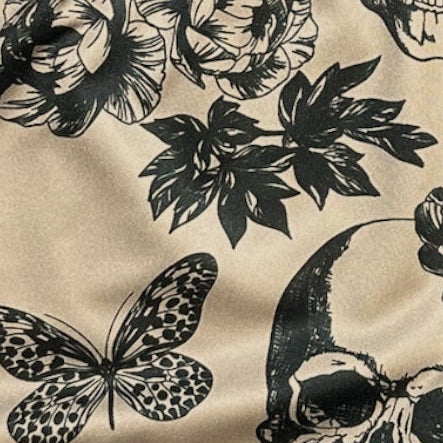 Close-up of RF-Wear Women's Split Skull Shorts in Cream/Black 