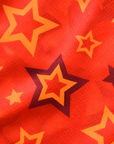 Close-up of RF-Wear Women's Star Shorts in Orange/Yellow