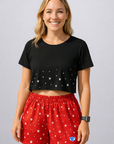 Woman wearing RF-Wear Women's Star Shorts in Red