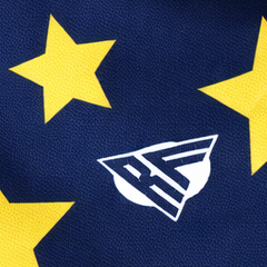 Close-up of RF-Wear Women's Star Shorts in Yellow/White/Navy with RF logo