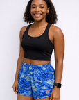 Woman wearing RF-Wear Women's Starry Night Shorts in Blue