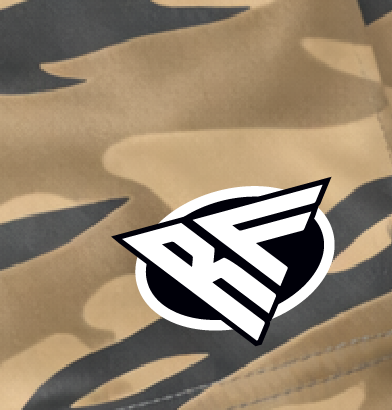 Close-up of RF-Wear Women's Tiger Camo Shorts in Tan with RF logo