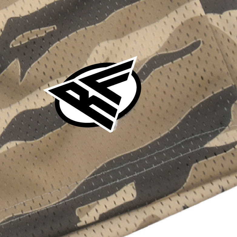 Close-up of RF-Wear Women's Tiger Camo Shorts in Tan with RF logo