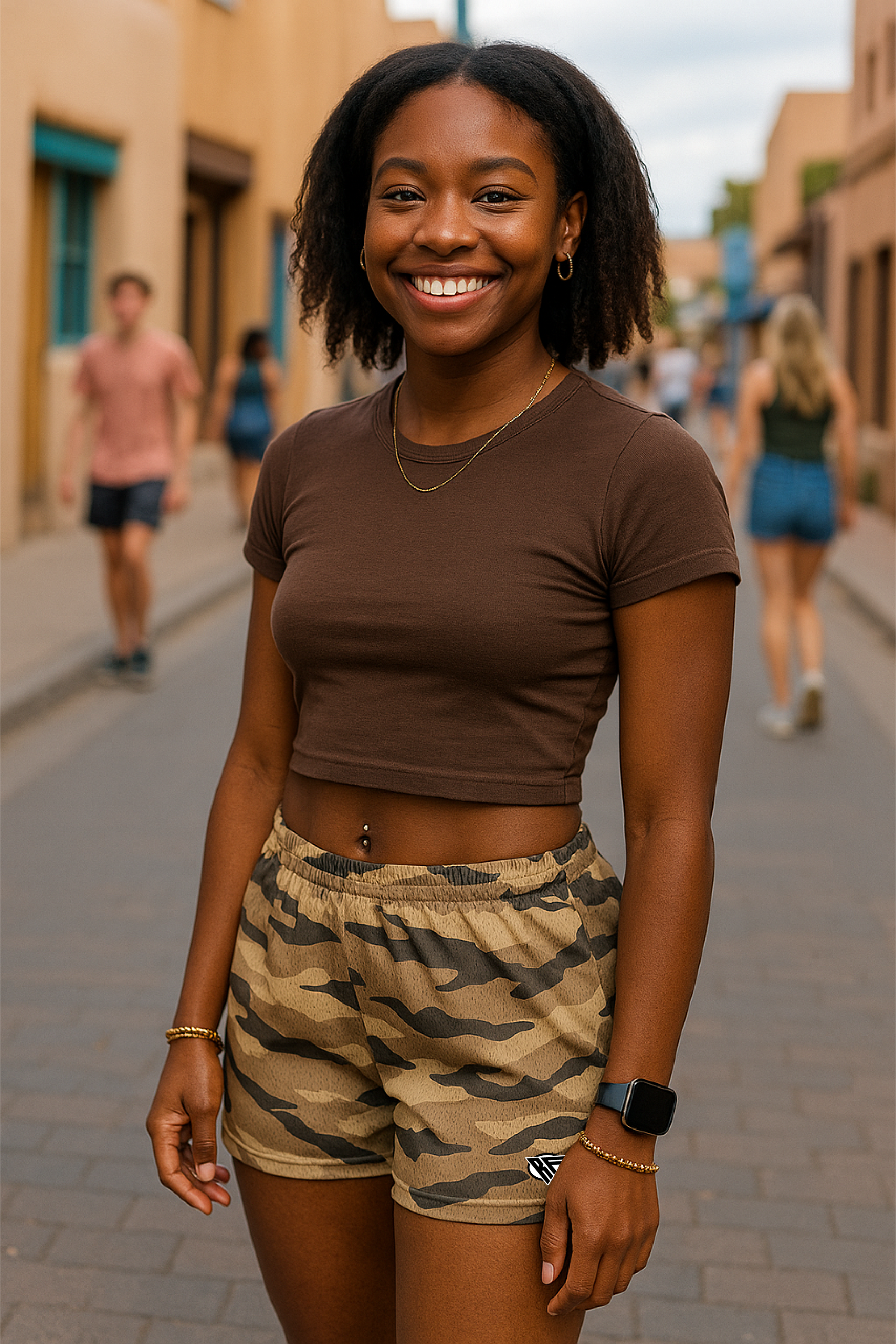 Woman wearing  a brown crop top with RF-Wear Women's Tiger Camo Shorts in Tan