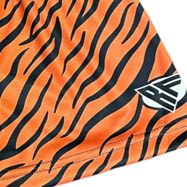 Close-up of RF-Wear Women's Animal Print Shorts - Tiger in Orange/Black with RF logo