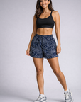 Woman wearing RF-Wear Women's Topography Shorts in Navy/Cream