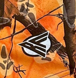 Close-up of RF-Wear Women's Tree Camo Ghost Faces Shorts in Orange with RF logo