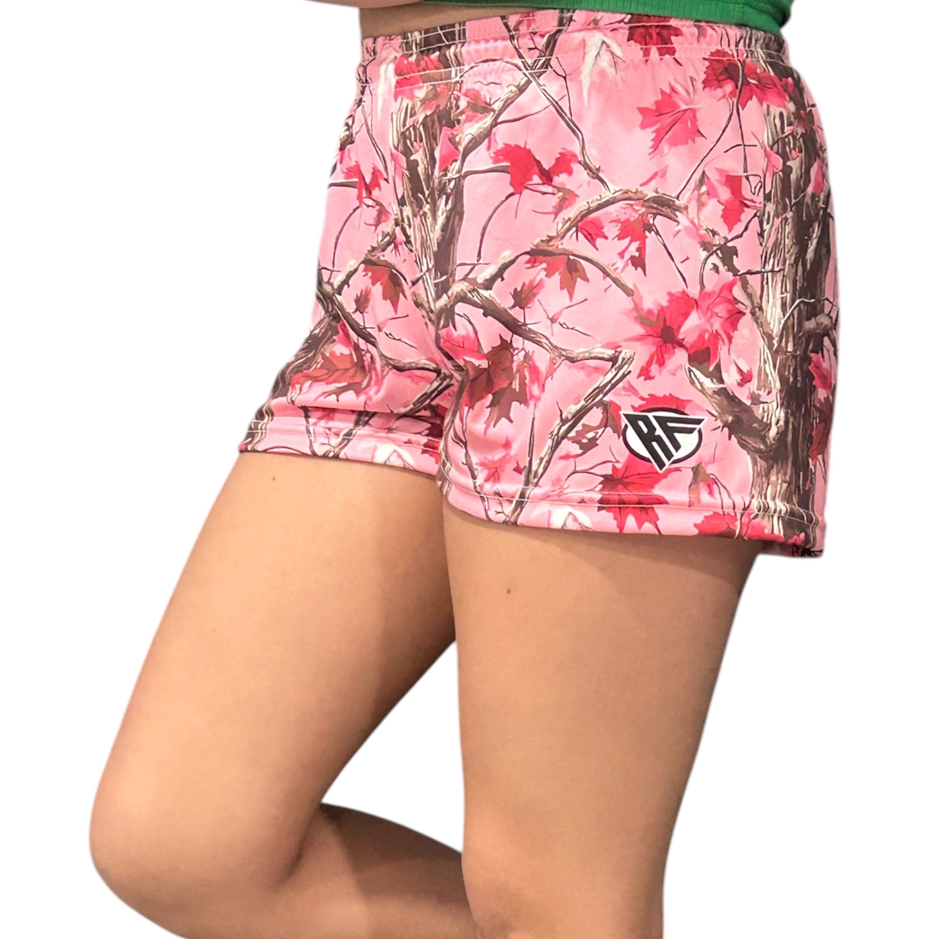 Woman wearing RF-Wear Women's Tree Camo Shorts - Light Pink - Side View