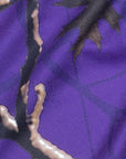 Close-up of purple tree camo shorts