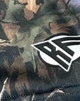 Close-up of RF-Wear Women's Tree Camo Shorts in  Storm with RF logo