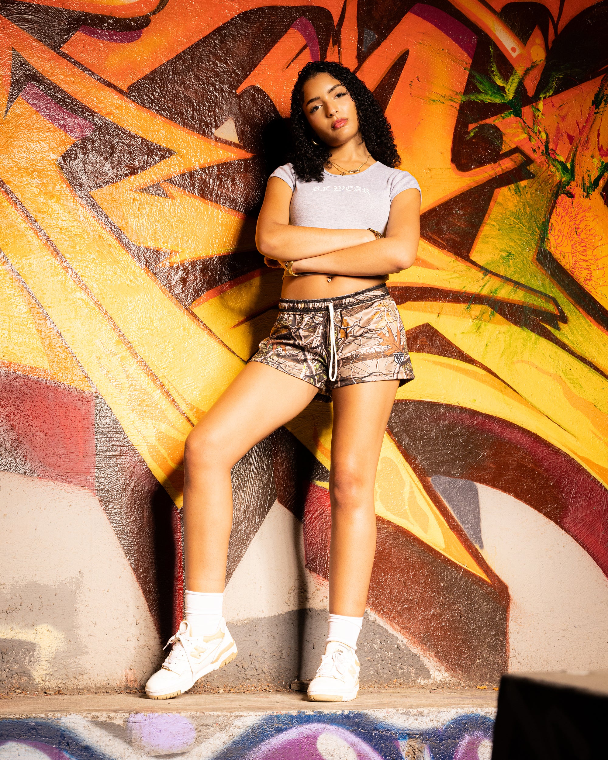 Woman wearing RF-Wear Women's Tree Camo Shorts - Tan 