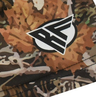 Close-up RF-Wear women's tan tree Camo shorts with the brand logo