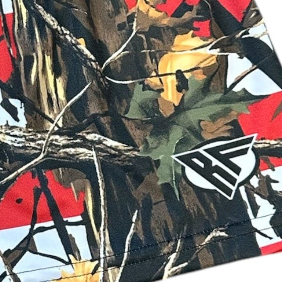 Close-up of RF-Wear Women's Tree Camo Shorts - USA Flag with brand logo