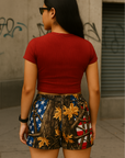 Woman wearing RF-Wear Women's Tree Camo Shorts - USA Flag - Back View