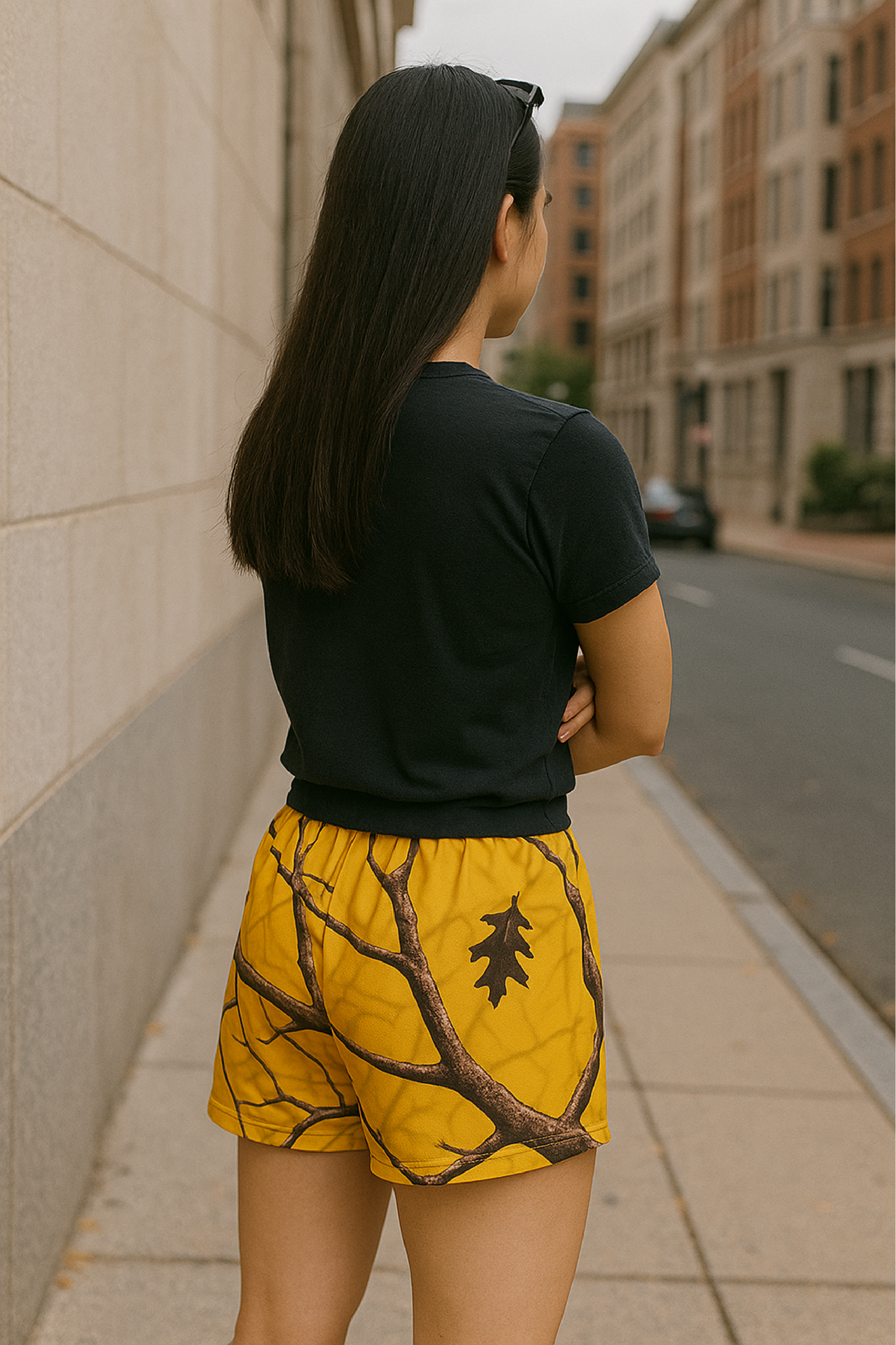 Woman wearing RF-Wear Women's Tree Camo Shorts - Yellow - Back View