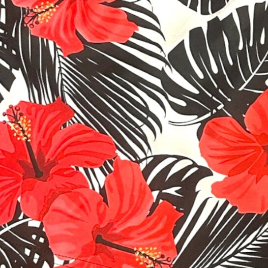 Close-up of RF-Wear Women's Tropical Flower - Coral on Black/White Shorts.