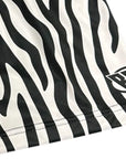 Close-up of RF-Wear Women's Animal Print Shorts - Zebra in Black/White with RF logo