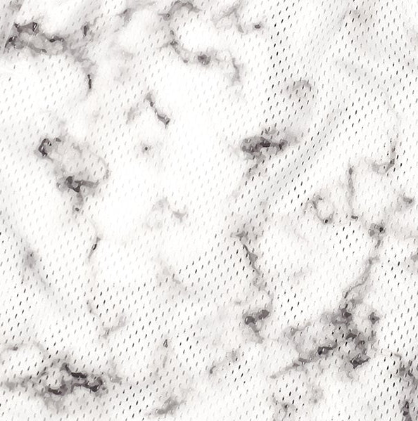 Close-up of RF-Wear Men's Mesh Marble Shorts in Black/White