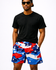 Man wearing a black t-shirt and RF-Wear Men's Mesh Patriotic Camo Shorts in Red/White/Blue