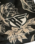 Close-up of RF-Wear Mens Split Skull shorts in Tan/Black with RF Logo