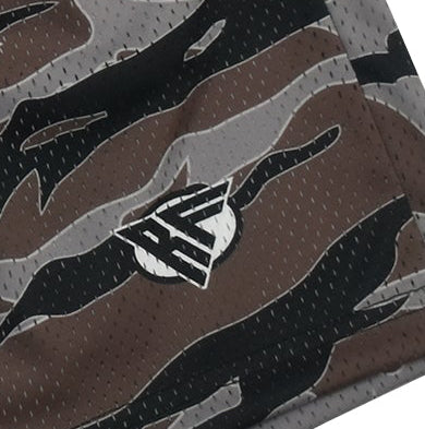 Brown desert camo shorts patterned with  a brand logo 