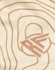 Close-up of RF-Wear Women's Topography Shorts in Cream/Tan with RF logo