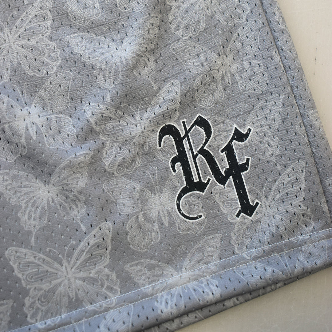 Close-up of RF-Wear Men's Mesh Butterfly Shorts in Grey with RF logo